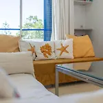 Tac - Windmill Oceanfront